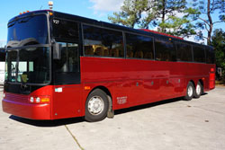 Maroon VanHool  57 passenger charter bu